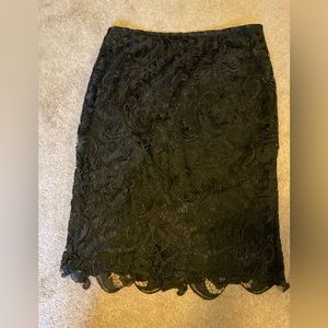 Absolutely lovely black lace skirt back zipper ex cond W 31” H 39” L 24”